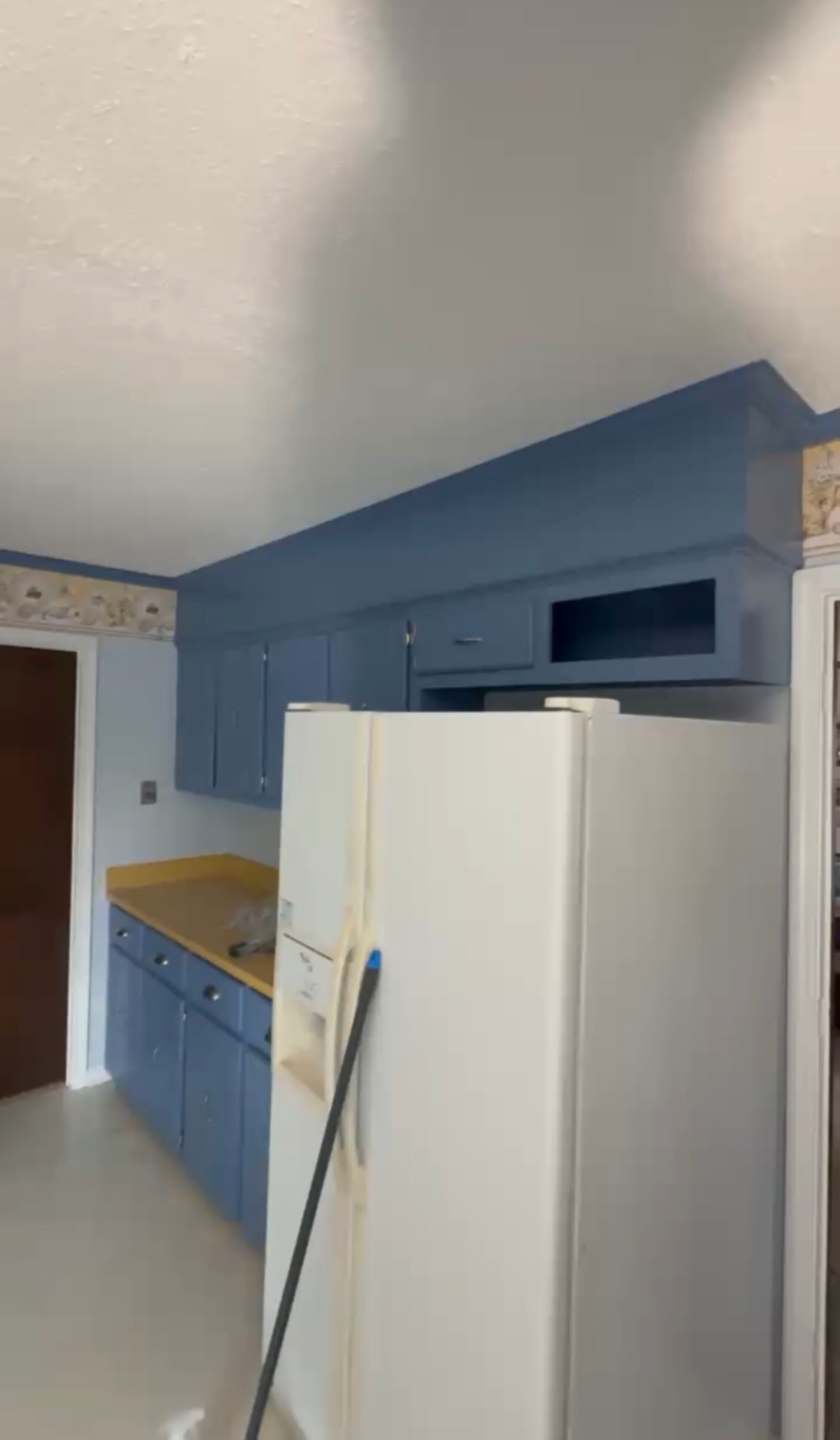 Kitchen cabinets refinished in a deep blue satin finish after professional cabinet painting — Kitchen Cabinet Refinish in Deep Blue in Lexington, SC